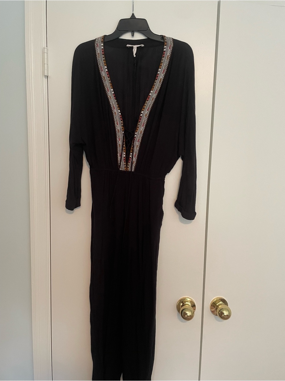 BCBGeneration Black Long Sleeve Jumpsuit with Colorful Embroidered Trim